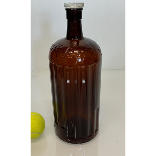 444 - an Amber glass poison bottle, 33 cm tall.

This lot is available for in-house shipping