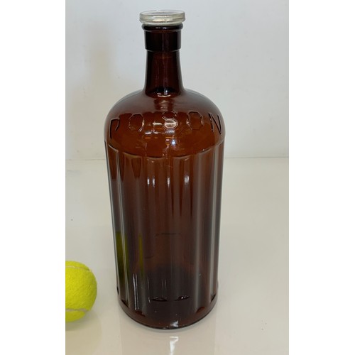 444 - an Amber glass poison bottle, 33 cm tall.

This lot is available for in-house shipping