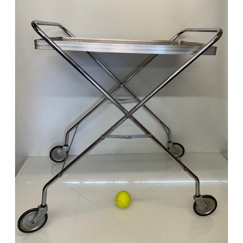 461 - Folding tea trolley, classic mid century furniture.

This lot is available for in-house shipping