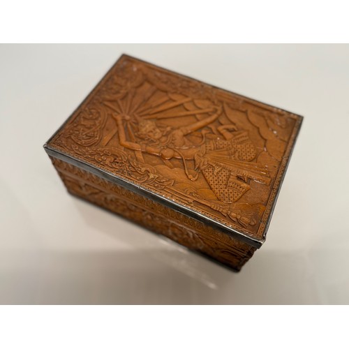 28 - Wooden box with hand carved decoration and white metal bindings, the lid has a dancer in front of a ... 