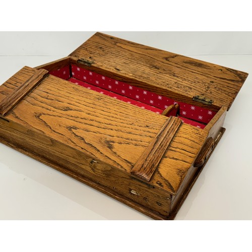 52 - Oak storage box with a two section opening top, 42cm x 28 cm x 10 cm.

This lot is available for in-... 