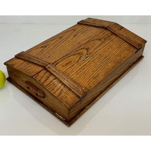 52 - Oak storage box with a two section opening top, 42cm x 28 cm x 10 cm.

This lot is available for in-... 