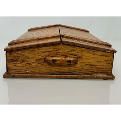 52 - Oak storage box with a two section opening top, 42cm x 28 cm x 10 cm.

This lot is available for in-... 