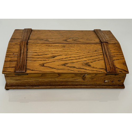 52 - Oak storage box with a two section opening top, 42cm x 28 cm x 10 cm.

This lot is available for in-... 