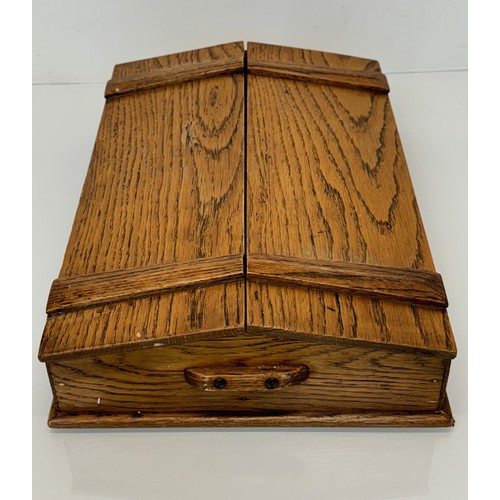 52 - Oak storage box with a two section opening top, 42cm x 28 cm x 10 cm.

This lot is available for in-... 