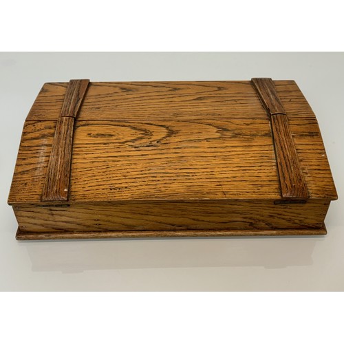 52 - Oak storage box with a two section opening top, 42cm x 28 cm x 10 cm.

This lot is available for in-... 