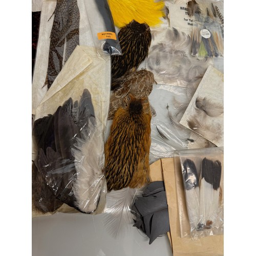 53 - Fly Fishing, angling equipment, taxidermy sections, a collection of fly tying substrates, fur feathe... 