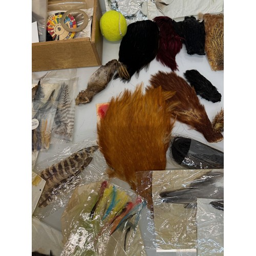 53 - Fly Fishing, angling equipment, taxidermy sections, a collection of fly tying substrates, fur feathe... 