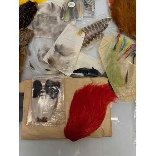 53 - Fly Fishing, angling equipment, taxidermy sections, a collection of fly tying substrates, fur feathe... 