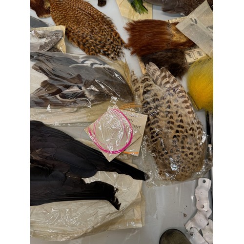 53 - Fly Fishing, angling equipment, taxidermy sections, a collection of fly tying substrates, fur feathe... 