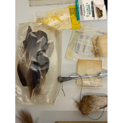 53 - Fly Fishing, angling equipment, taxidermy sections, a collection of fly tying substrates, fur feathe... 