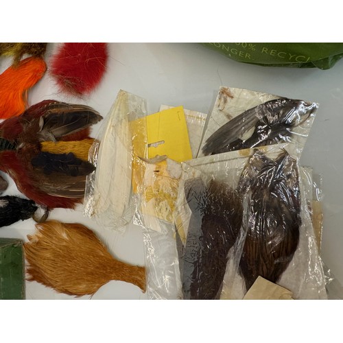 53 - Fly Fishing, angling equipment, taxidermy sections, a collection of fly tying substrates, fur feathe... 