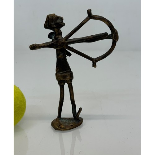 69 - Cast bronze tribal art figure of an archer. 16 cm tall.

This lot is available for in-house shipping