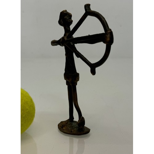 69 - Cast bronze tribal art figure of an archer. 16 cm tall.

This lot is available for in-house shipping