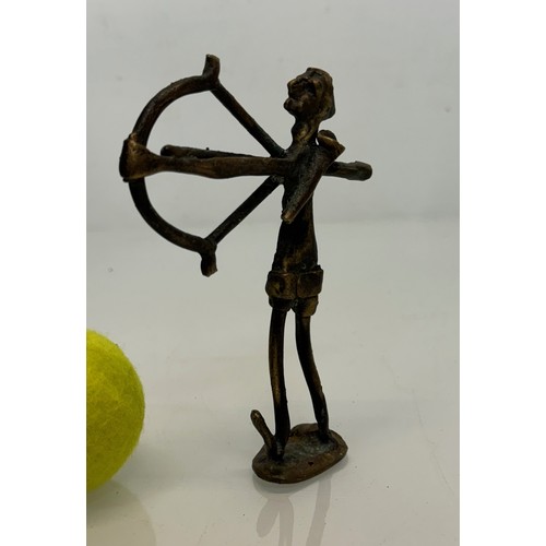 69 - Cast bronze tribal art figure of an archer. 16 cm tall.

This lot is available for in-house shipping