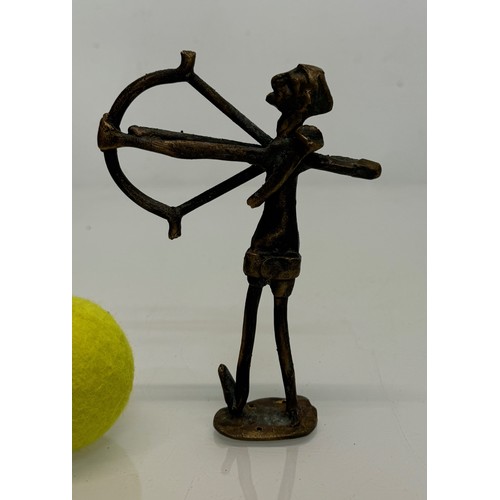 69 - Cast bronze tribal art figure of an archer. 16 cm tall.

This lot is available for in-house shipping