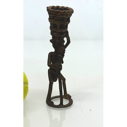 70 - Cast bronze tribal art figure with a basket on his head. 13 cm tall.

This lot is available for in-h... 