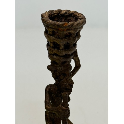 70 - Cast bronze tribal art figure with a basket on his head. 13 cm tall.

This lot is available for in-h... 