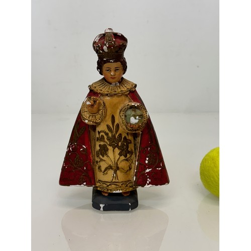 72 - A decorated plaster relique, a religious figure.

This lot is available for in-house shipping