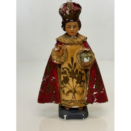 72 - A decorated plaster relique, a religious figure.

This lot is available for in-house shipping