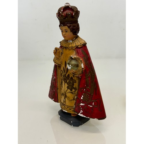 72 - A decorated plaster relique, a religious figure.

This lot is available for in-house shipping