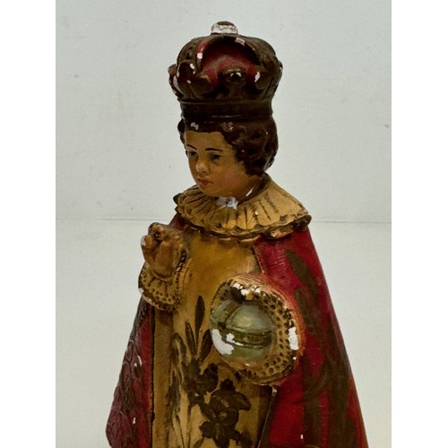 72 - A decorated plaster relique, a religious figure.

This lot is available for in-house shipping