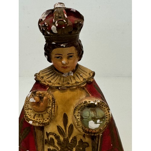 72 - A decorated plaster relique, a religious figure.

This lot is available for in-house shipping