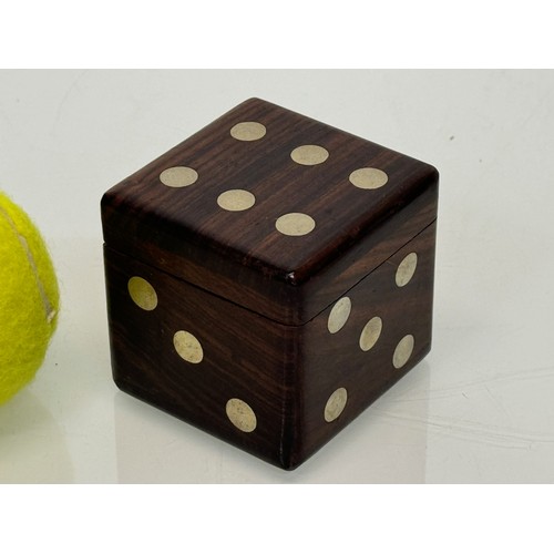 79 - Gambling, gaming interest, a treen Dice, a hardwood box in the inlaid in the form of a dice containi... 