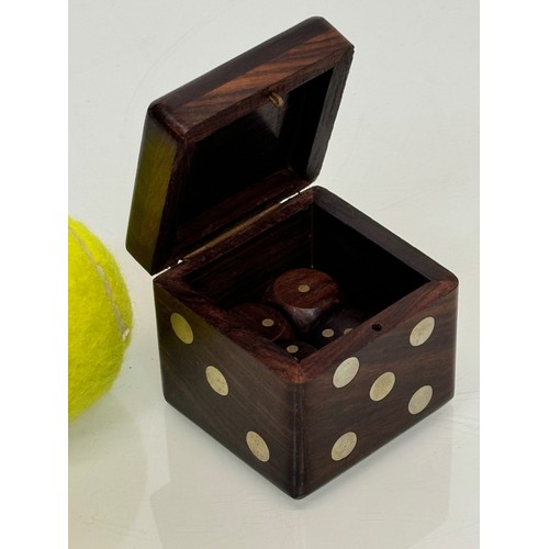 79 - Gambling, gaming interest, a treen Dice, a hardwood box in the inlaid in the form of a dice containi... 