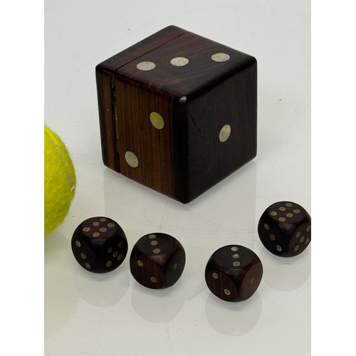 79 - Gambling, gaming interest, a treen Dice, a hardwood box in the inlaid in the form of a dice containi... 