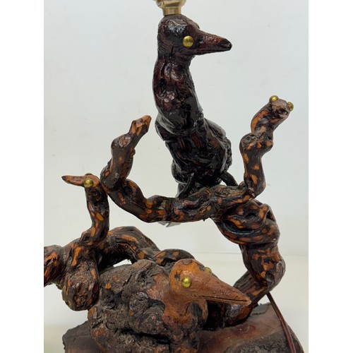 82 - Naive art, a French folk art lamp base from a carved vine section as bird and snake figures amongst ... 