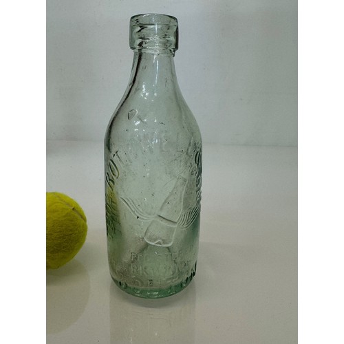 83 - A collection of dug glass drinks bottles, Wales, London, Essex, Cheshire, Bolton, Bedford, and Hitch... 