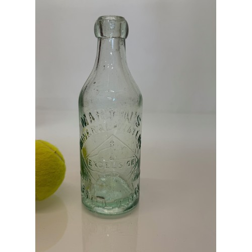 83 - A collection of dug glass drinks bottles, Wales, London, Essex, Cheshire, Bolton, Bedford, and Hitch... 