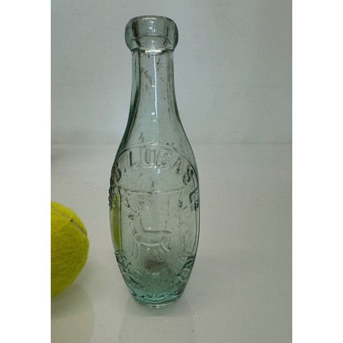 83 - A collection of dug glass drinks bottles, Wales, London, Essex, Cheshire, Bolton, Bedford, and Hitch... 