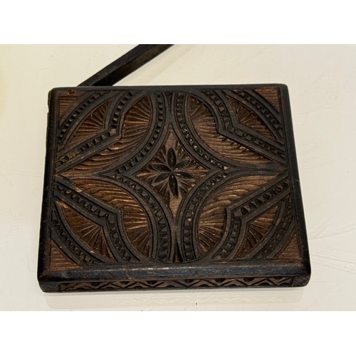 100 - A carved wooden card case, hand decorated on all sides, 10 cm x 8.5 cm.

This lot is available for i... 