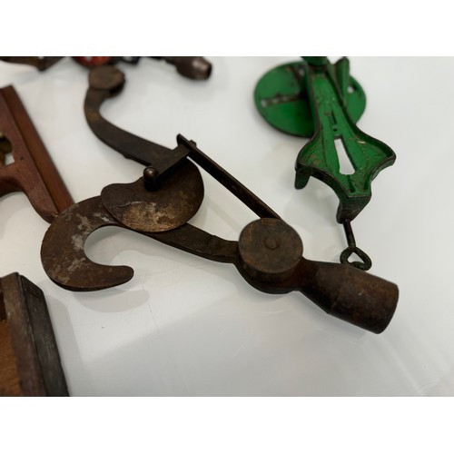 105 - Mixed lot, Clock face, tools, an iron and door fittings.

This lot is available for in-house shippin... 