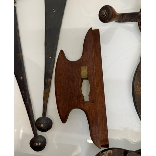 105 - Mixed lot, Clock face, tools, an iron and door fittings.

This lot is available for in-house shippin... 