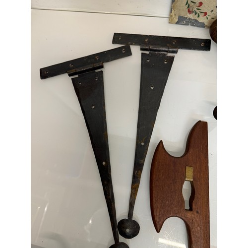 105 - Mixed lot, Clock face, tools, an iron and door fittings.

This lot is available for in-house shippin... 