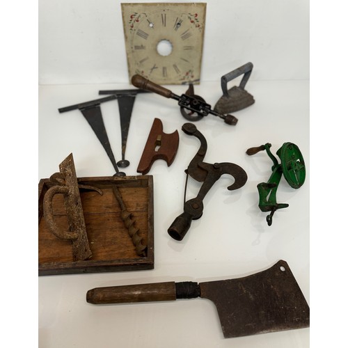 105 - Mixed lot, Clock face, tools, an iron and door fittings.

This lot is available for in-house shippin... 