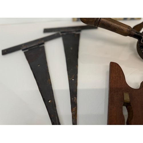 105 - Mixed lot, Clock face, tools, an iron and door fittings.

This lot is available for in-house shippin... 