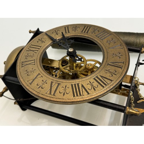 107 - Wall clock with an open case showing the movement. Pendulum is 32 cm long. Dial is 14 cm in diameter... 