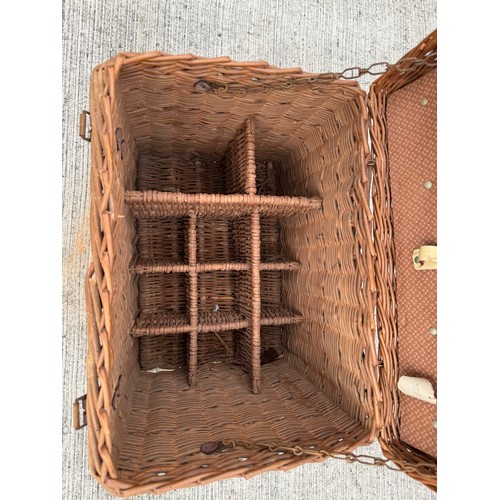 117 - A Brexton wicker work hamper with bottle divisions sectioned off within. A/f 46 cm x 32 cm x 37 cm h... 