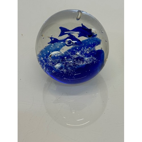 128 - Murano glass paperweight with two blue fish inside.7 cm tall.

This lot is available for in-house sh... 