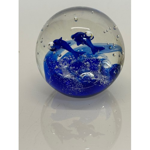 128 - Murano glass paperweight with two blue fish inside.7 cm tall.

This lot is available for in-house sh... 