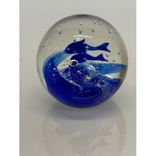 128 - Murano glass paperweight with two blue fish inside.7 cm tall.

This lot is available for in-house sh... 