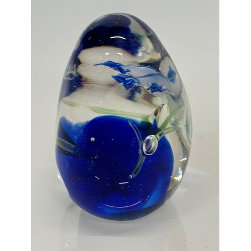 130 - Glass paperweight with two dolphin’s inside an underwater setting. 8 cm high.

This lot is available... 