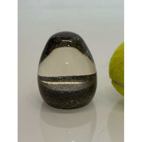 131 - Murano glass paperweight with a finely detailed textured inner structure. 7 cm high.

This lot is av... 