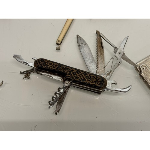 138 - 7 folding pocket knives and multitool’s.

This lot is available for in-house shipping