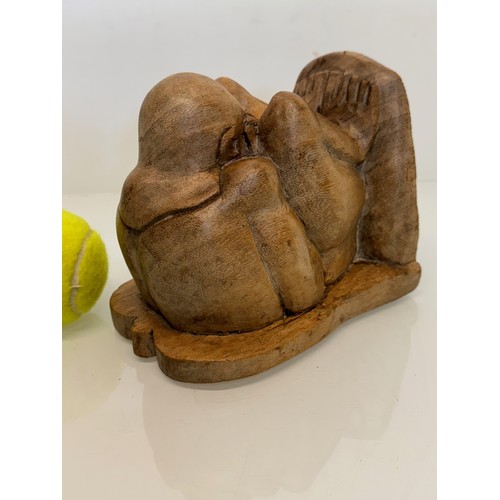 141 - Hand carved constricted figural book end, 16 cm high.

This lot is available for in-house shipping