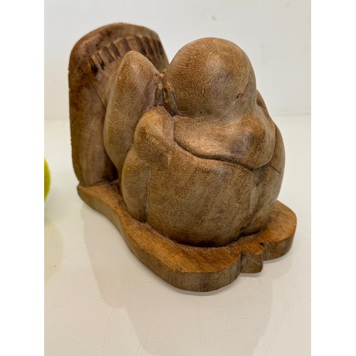 141 - Hand carved constricted figural book end, 16 cm high.

This lot is available for in-house shipping